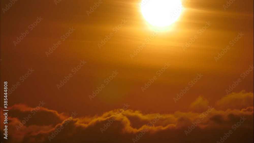 Skyscape. Red burning sky with clouds at sunset. Morning nature landscape. Time lapse Skyscape. Red burning sky with clouds at sunset. Morning nature landscape. Time lapse