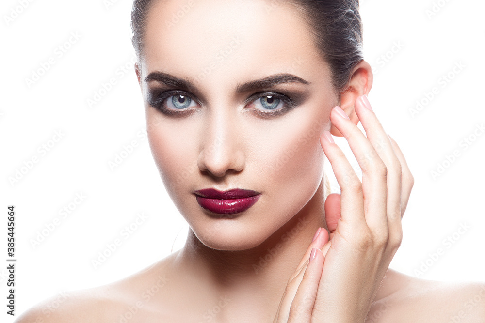 Beauty girl face. Perfect skin. Bright red lips make-up, isolated on white Beauty girl face. Perfect skin. Bright red lips make-up, isolated on white