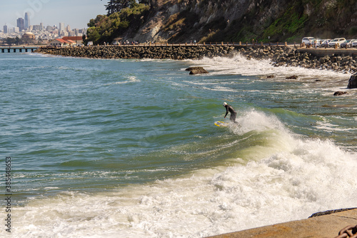 Canvas Print A surfer riding a wave in San Francisco.