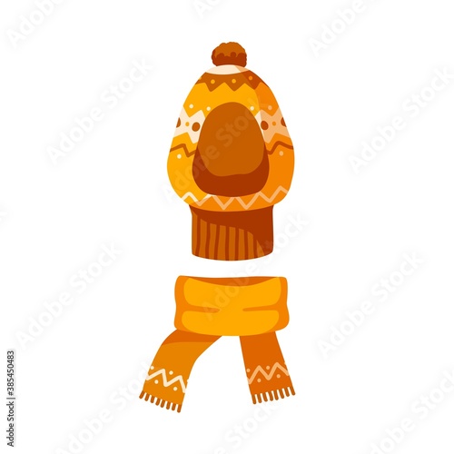 Ornamented childish balaclava and knitted scarf. Winter unisex orange hat with pompon for children. Flat vector cartoon illustration of warm kids headwear isolated on white background