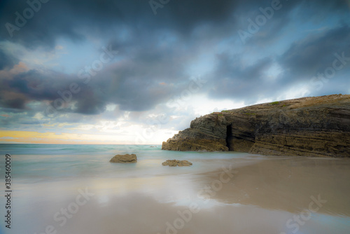 sunset at the Catedrales or Augas Santas beach, in Ribadeo. Lugo, Galicia photo