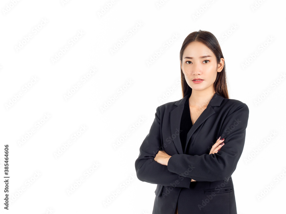 A pretty young Asian business woman in black suit. A pretty young Asian business woman in black suit.