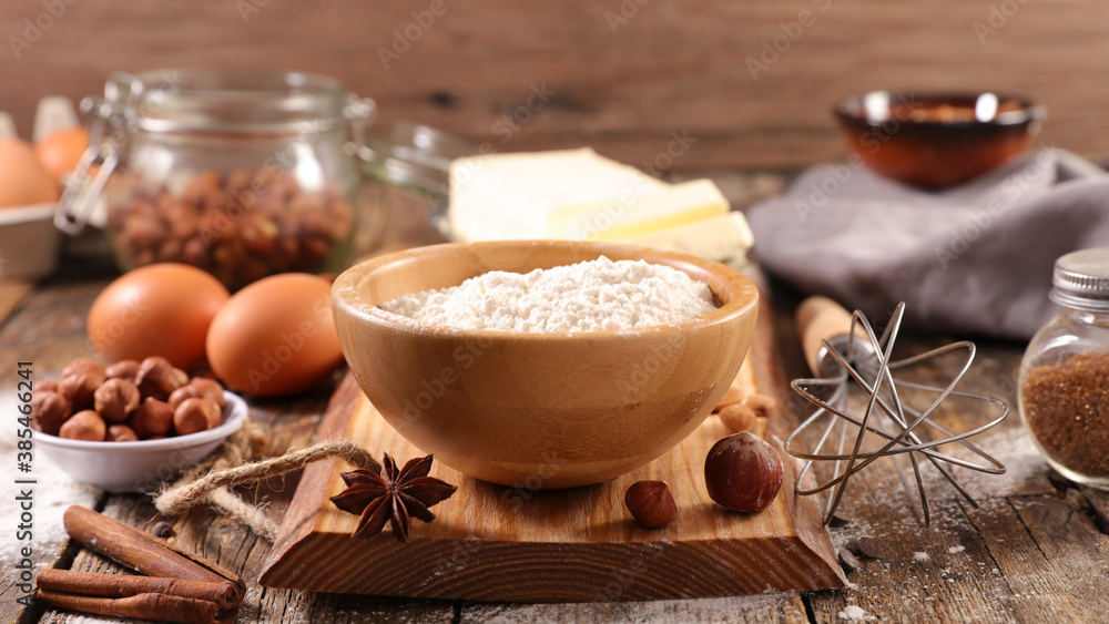 baking food ingredient- flour, butter, egg and spices baking food ingredient- flour, butter, egg and spices