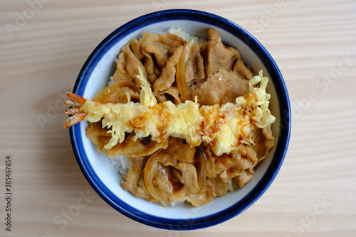 Japanese grilled beef with rice (Gyu Donburi) on wooden table : Top view.