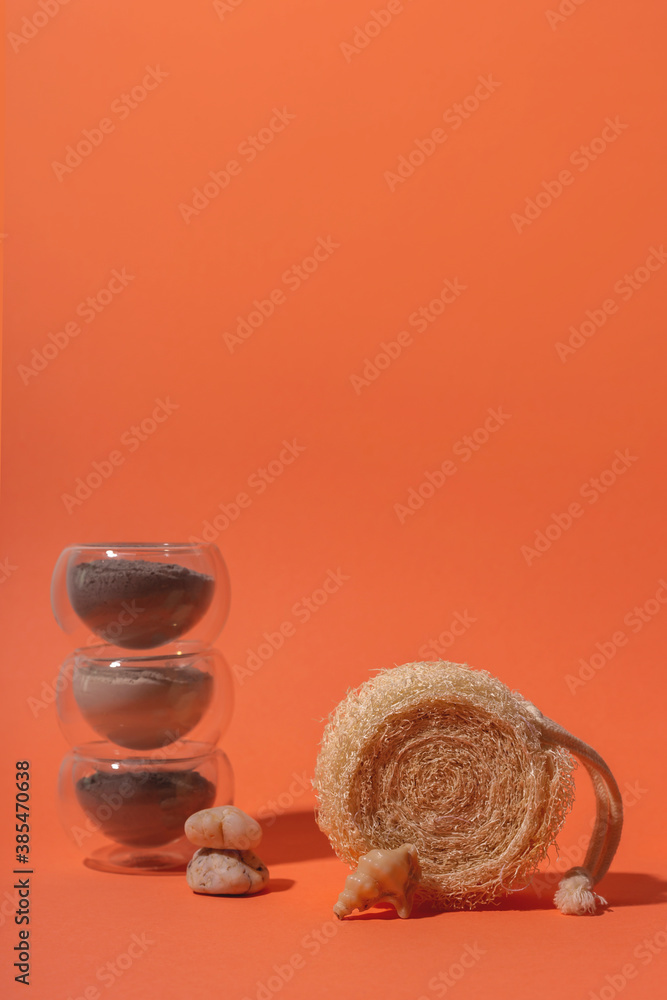 Eco-friendly loofah scrubber and clay for face mask in glass bowls. Eco-friendly loofah scrubber and clay for face mask in glass bowls.
