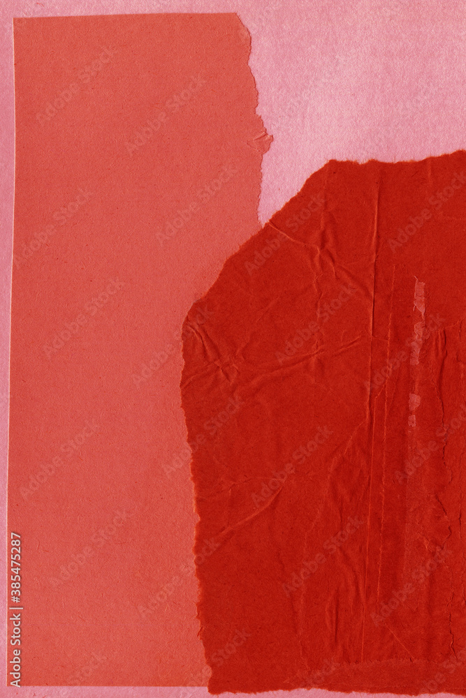 Naklejka premium Red vintage and old looking crumpled paper background. Retro cardboard texture. Grunge paper for drawing. Ancient book page. Present wrapping.