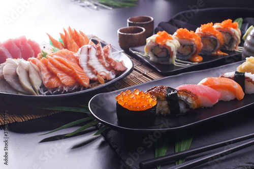 Sashimi and sushi Japanese food set. Salmon, Ikura, wasabi, fish, shrimp and tuna.