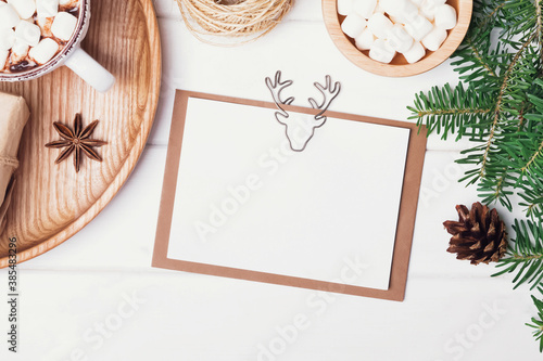 Christmas card mock-up on the white table