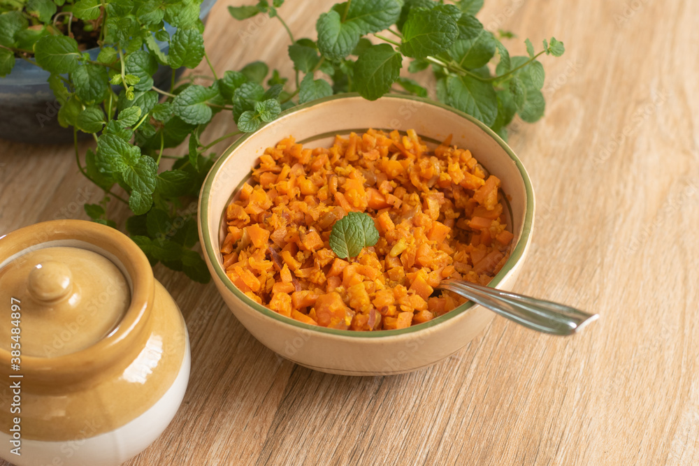 Carrot sabzi , Gajar sabji , vegetable stir fry with grated coconut Carrot Thoran South Indian Cuisine Kerala India. wooden background Carrot sabzi , Gajar sabji , vegetable stir fry with grated coconut Carrot Thoran South Indian Cuisine Kerala India. wooden background
