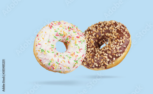 Donuts Isolated on Blue Background. Different type of doughnuts
