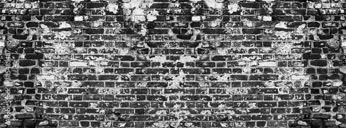 Grunge black brick wall background texture