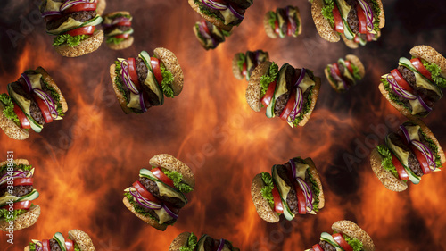 Hamburgers falling with smoke and burning fire in background. Fast food menu promo