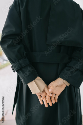 close-up of beautiful cool fashion clothes with hands