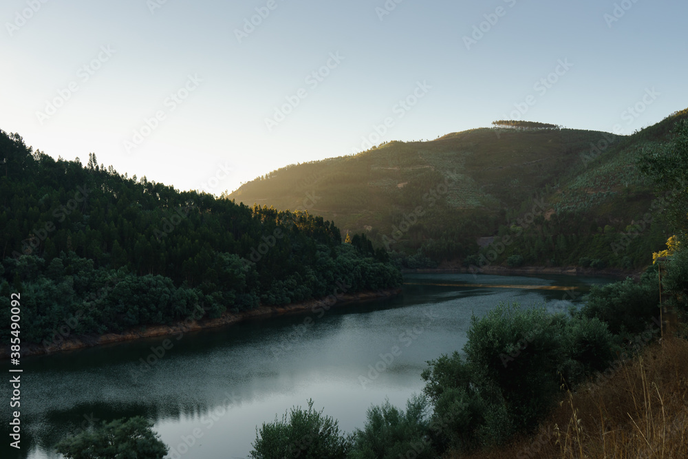 Obraz premium River in the mountains at sunrise 