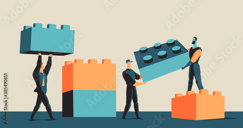 Persone che lavorano insieme per costruire una città fatta di mattoncini Brick.