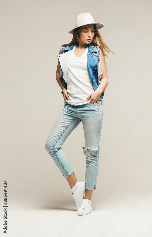 beautiful blond woman in denim waistcoat and cat beautiful blond woman in denim waistcoat and cat