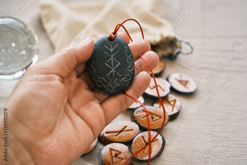 rune stone good luck and riches talisman with runescript