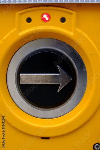 close up of a cross-walk button