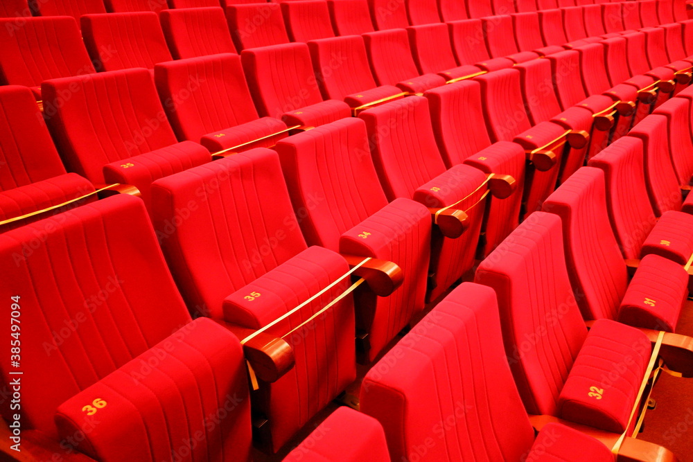 Obraz premium seats in the theater. Social distance between spectators in the hall. Social distance restrictions