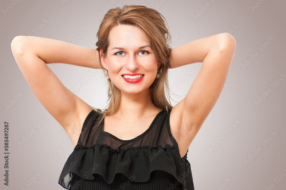 Fototapeta premium a beautiful woman posing and smiling coquettishly