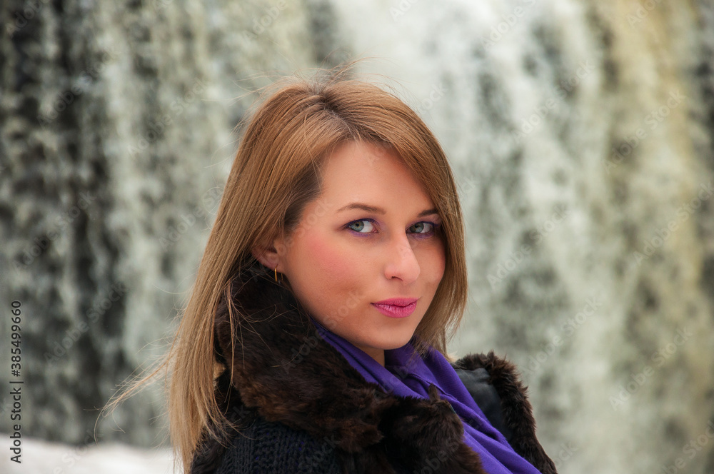woman portrait on a waterfall background woman portrait on a waterfall background