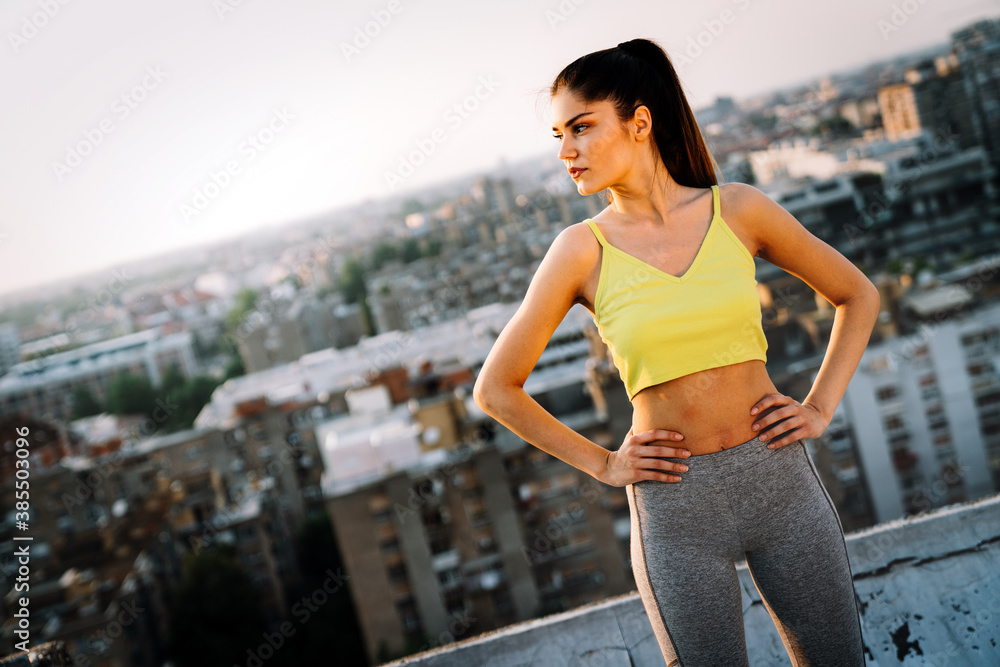 Fototapeta premium Portrait of fitness beauty sexy woman exercising outdoor