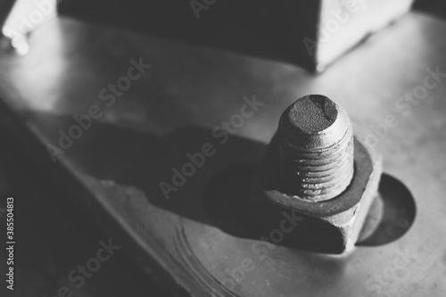 Bolt and nut in black and white abstract background