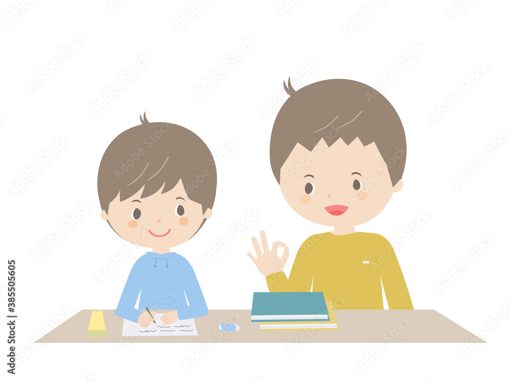 Boy doing homework with his father Boy doing homework with his father