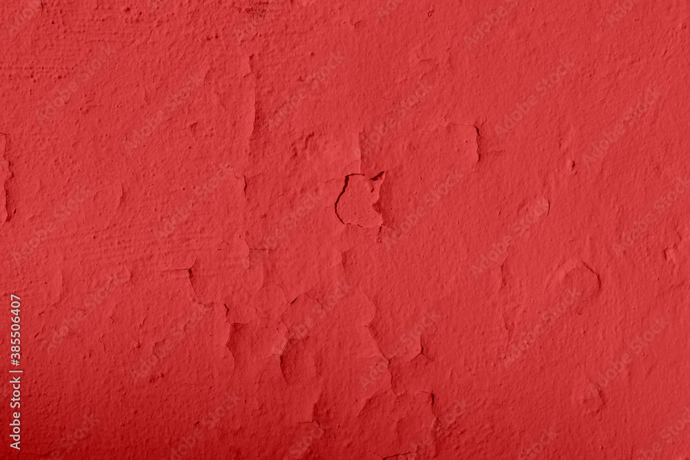 Red cracked paint texture. Background of old red surface with paint swell Red cracked paint texture. Background of old red surface with paint swell