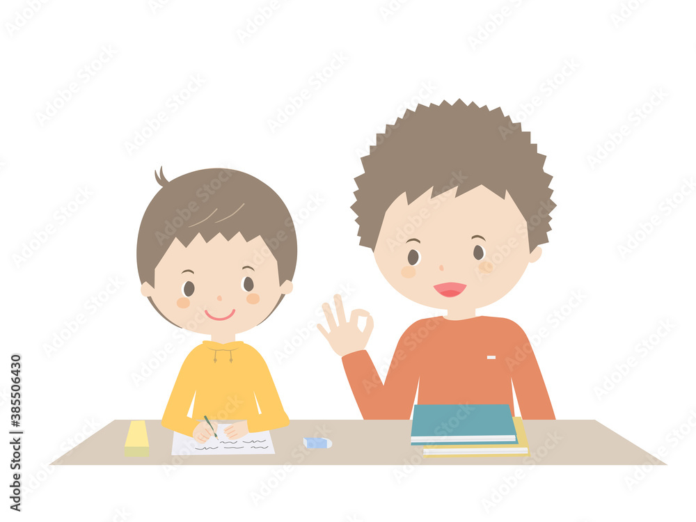 Boy doing homework with his father Boy doing homework with his father
