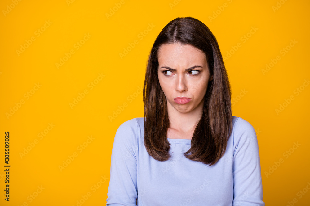 Photo of attractive pretty sad upset lady offended look side empty space moody disappointed boyfriend unpleasant words wear casual shirt isolated vibrant yellow color background Photo of attractive pretty sad upset lady offended look side empty space moody disappointed boyfriend unpleasant words wear casual shirt isolated vibrant yellow color background