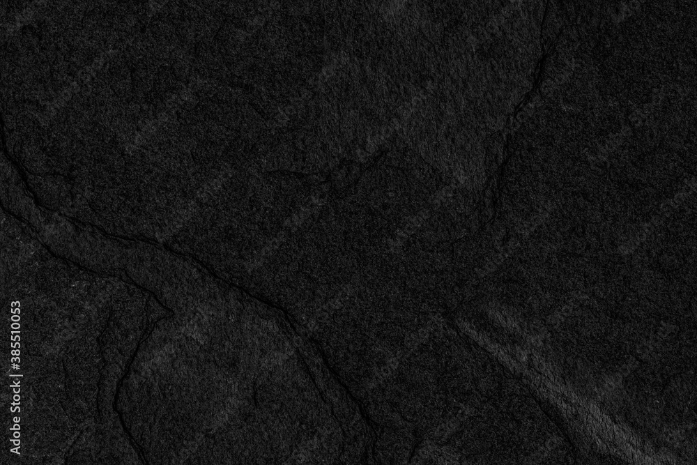 Dark grey black slate background or texture. Black granite slabs background Dark grey black slate background or texture. Black granite slabs background