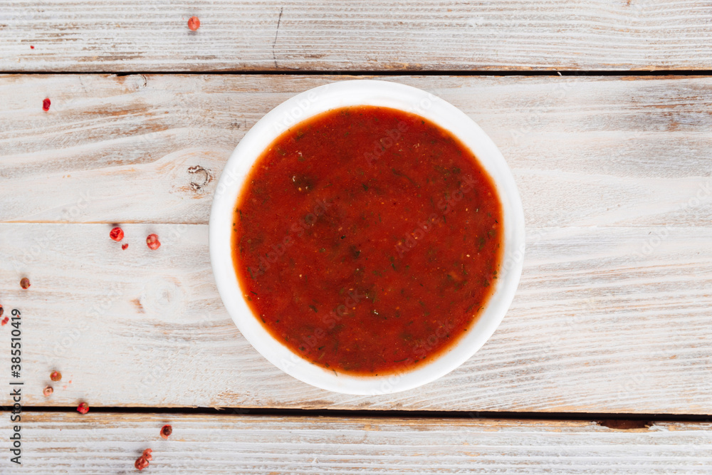 Top view on red spiced sauce for meat