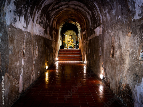 Ancient Golden Bhddha Statue is Illuminated inside TheTunnel