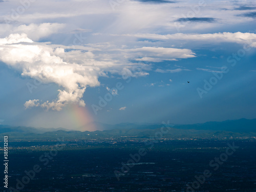 Light Shines as a Beam of Light becomes The Rainbow Above The City of Chiang Mai