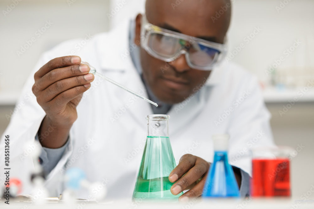 professional chemist man doing tests professional chemist man doing tests