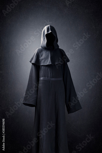 Obraz na płótnie Scary figure in hooded cloak