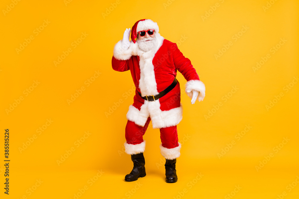 Full length body size view of his he nice funny cheery positive white-haired Santa St Nicholas dancing having fun rest chill isolated bright vivid shine vibrant yellow color background Full length body size view of his he nice funny cheery positive white-haired Santa St Nicholas dancing having fun rest chill isolated bright vivid shine vibrant yellow color background