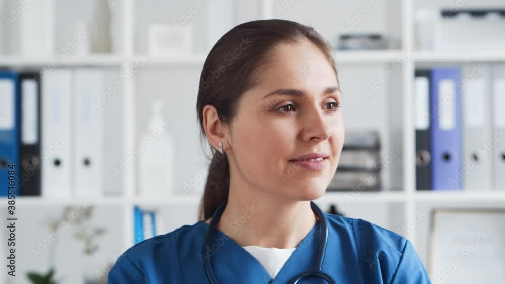 Professional medical doctor in hospital office, Portrait of young and attractive female physician. Professional medical doctor in hospital office, Portrait of young and attractive female physician.