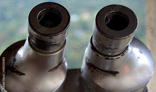 Photos professional work on coronavirus research using a microscope or binoculars under