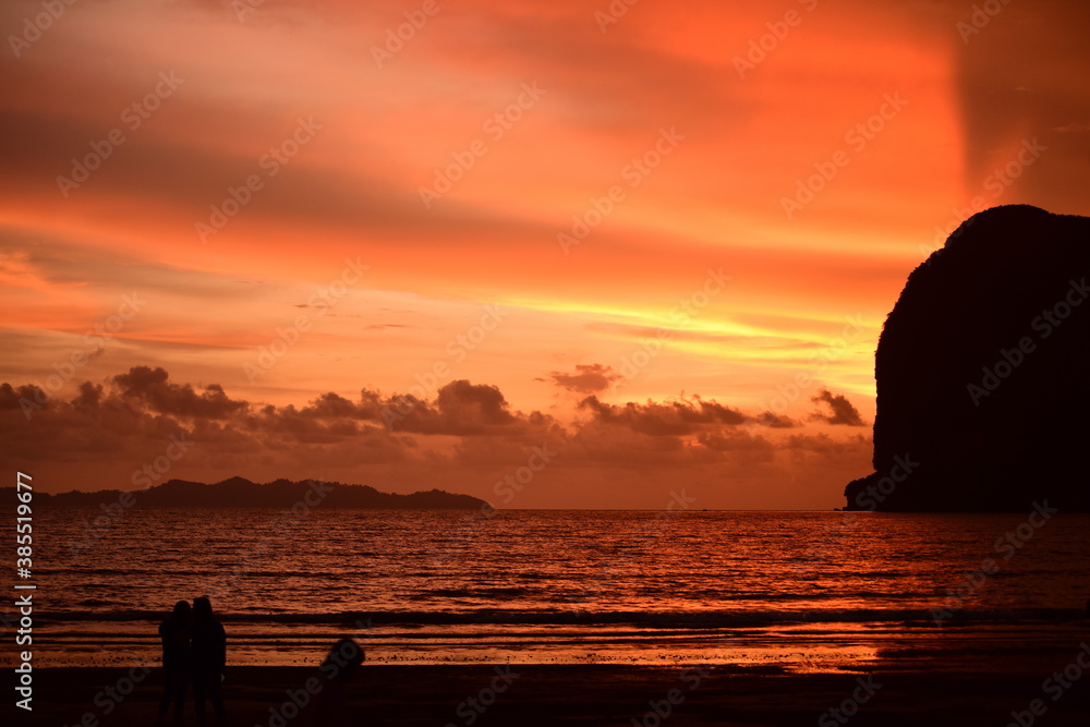 Sunset view with beautiful golden sky,the colorful sky lights in the evening