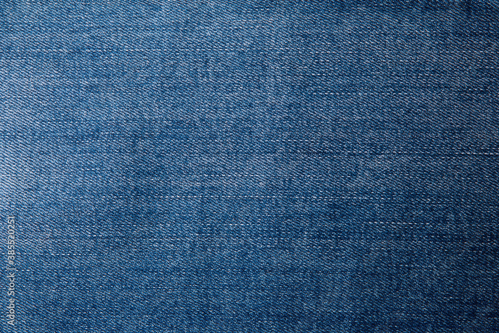 Texture of dark grated denim as background. Close-up Texture of dark grated denim as background. Close-up