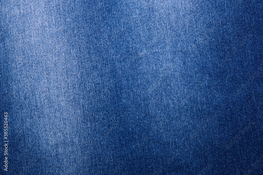 Texture of dark grated denim as background. Close-up Texture of dark grated denim as background. Close-up