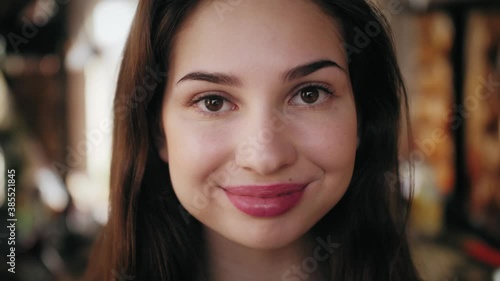 Wallpaper Mural Portrait of smiling young white woman looking at camera. Pretty confident woman. Close up of face. Torontodigital.ca