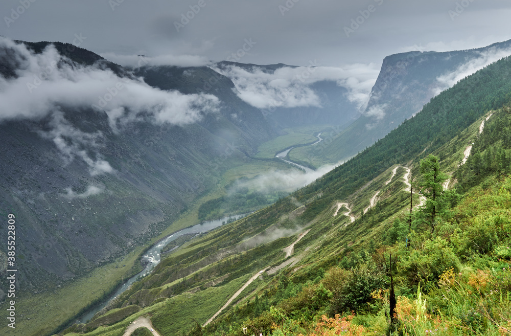 a dangerous road through the Katu-Yaryk pass, descends into the river valley.
