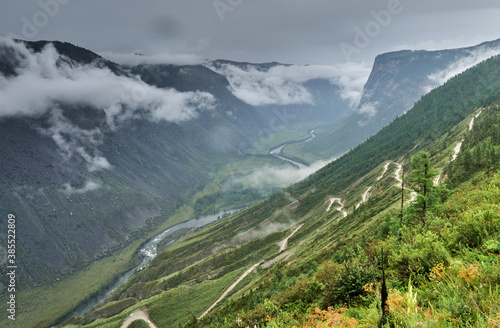a dangerous road through the Katu-Yaryk pass, descends into the river valley.