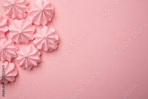 Pink meringues on a delicate pink background. Background idea © Arina B