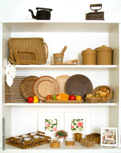 white bookcase with decorative objects