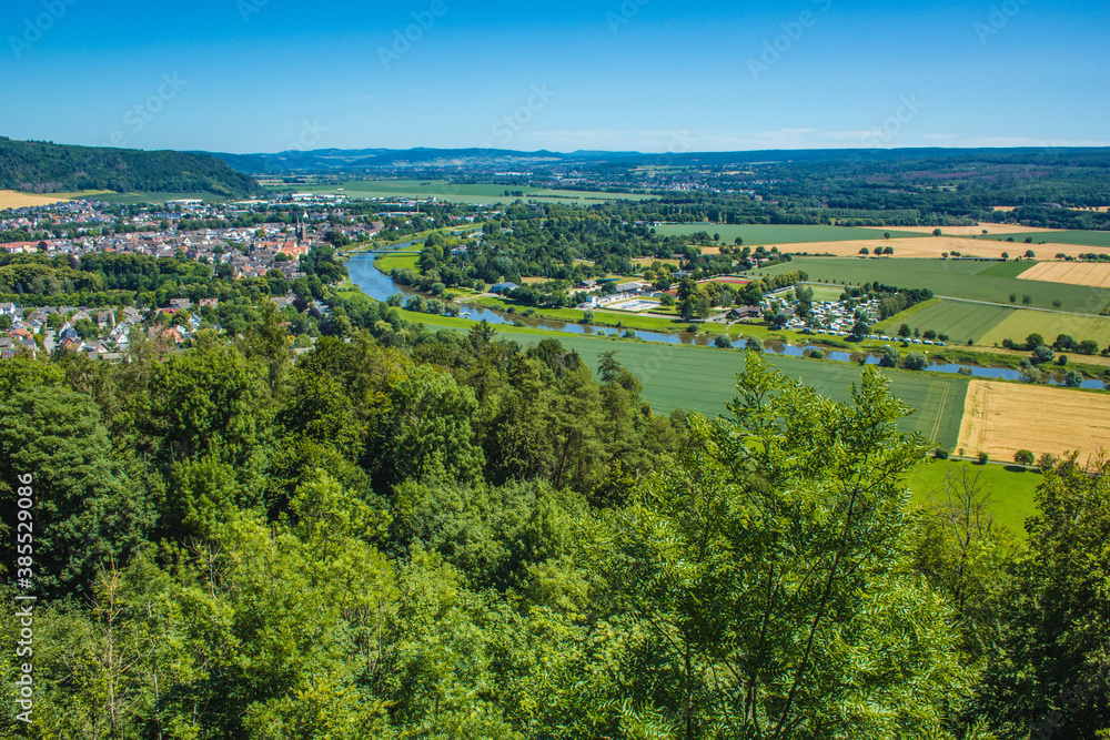 Weser Uplands / Weser Hills. View of Weser river and surroundings near the city of Höxter in North Rhine Westphalia, Germany