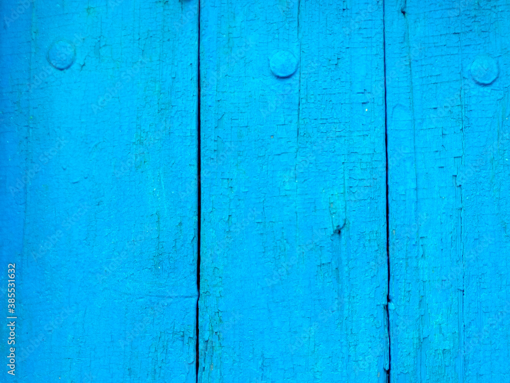 texture of old painted shabby rustic wooden fence made of planks, with rusty nails, grunge background texture of old painted shabby rustic wooden fence made of planks, with rusty nails, grunge background